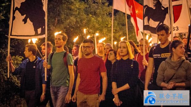 Sellner on a torch-lit march near Vienna in September 2017